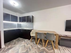 Kuchyň nebo kuchyňský kout v ubytování Ski cosy apartment 5