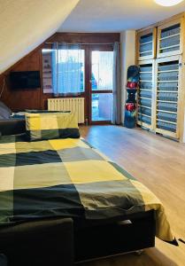 Posteľ alebo postele v izbe v ubytovaní Cervinia appartamento monolocale