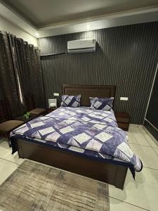 Postel nebo postele na pokoji v ubytování Paradise Stays