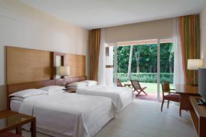 Postel nebo postele na pokoji v ubytování Sheraton Hua Hin Resort & Spa