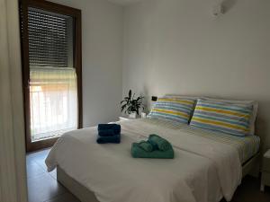 Posteľ alebo postele v izbe v ubytovaní Casa Roxy