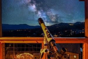 a view of a starry sky from a window at Big Bear Shack - Handicap Accessible & Dog Friendly in Gatlinburg