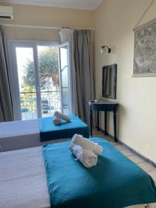 Postel nebo postele na pokoji v ubytování Casa Dei Venti Sea View Appartments