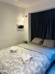 Postel nebo postele na pokoji v ubytování Cosy
