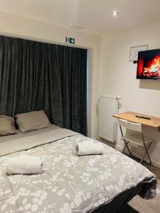 Postel nebo postele na pokoji v ubytování Cosy