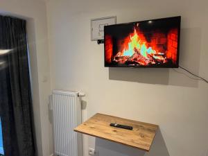 TV a/nebo společenská místnost v ubytování Cosy