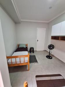 Ένα ή περισσότερα κρεβάτια σε δωμάτιο στο Hostel BELLA ARAÚJO ALFA +11 φωτογραφίες