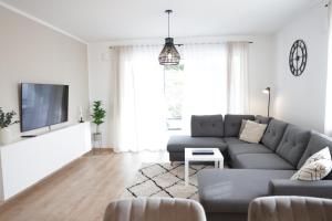 TV a/nebo společenská místnost v ubytování Auszeit im Feriendomizil