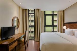Katil atau katil-katil dalam bilik di Protea Hotel by Marriott Ikeja Select