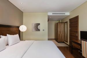 Katil atau katil-katil dalam bilik di Protea Hotel by Marriott Ikeja Select