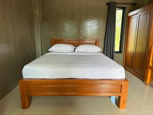 Postel nebo postele na pokoji v ubytování Wisuthida Resort