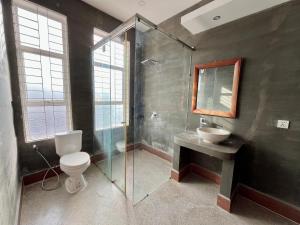 Koupelna v ubytování Canopy Residence + 33 fotografií