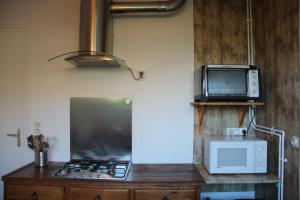 Una cocina o cocineta en Gite l'Estibère en Val d'Azun 7 fotos más