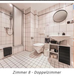 Koupelna v ubytování Hotel Weinstube am Markt