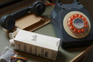 a telephone and a box on a table at MOXY NYC Times Square in New York