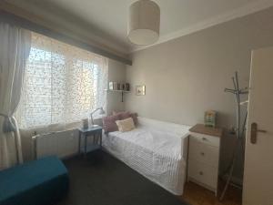 Postel nebo postele na pokoji v ubytování Beautiful penthouse apartment