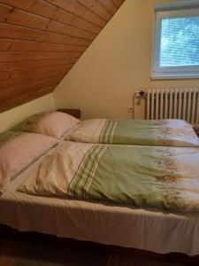 Letto o letti in una camera di Chata Kubko