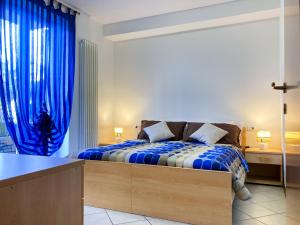 Postel nebo postele na pokoji v ubytování Elegante 1 Br, Bellavista in Valsugana, Trentino