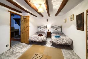 Cama o camas de una habitación en Mirador del Maestrazgo