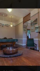 a living room filled with furniture and a fire place at Daly View Bed & Breakfast in Fremantle