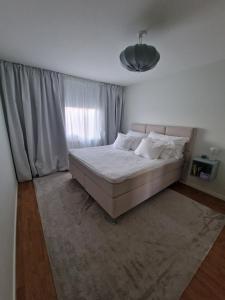 Postel nebo postele na pokoji v ubytování Central lägenhet i Visby -4 person inkl parkering
