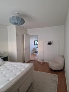 Postel nebo postele na pokoji v ubytování Central lägenhet i Visby -4 person inkl parkering