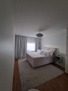 Postel nebo postele na pokoji v ubytování Central lägenhet i Visby -4 person inkl parkering