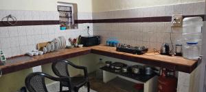 Kuchyň nebo kuchyňský kout v ubytování Moon Glade Cottage, Homestay Coorg, Madikeri