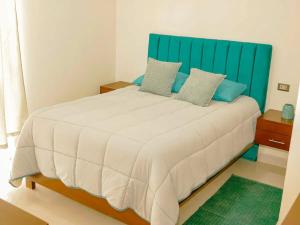 Katil atau katil-katil dalam bilik di Lujo y confort en Tarija con Jacuzzi y Sauna