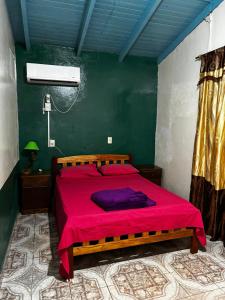 En eller flere senge i et værelse på Casa Roma