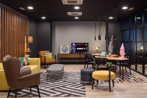 Posezení v ubytování Moxy Lisboa Oriente