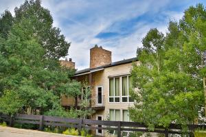 an old house with a chimney on top of it at Mountainside 037 in Granby