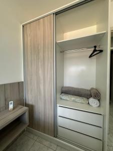 Katil atau katil-katil dalam bilik di Apartamento 1 dorm com garagem