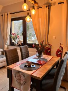 Posedenie v ubytovaní Apartamenty Czarna Perła