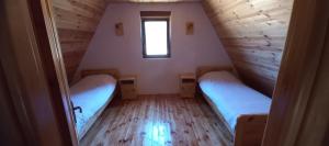 Postel nebo postele na pokoji v ubytování Chalet Čilac