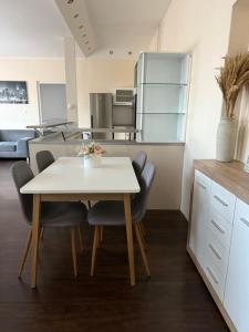 Kuchyň nebo kuchyňský kout v ubytování GM Home