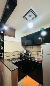 Kuchyň nebo kuchyňský kout v ubytování Appartement au centre de TIZNIT