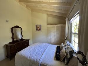 Ένα ή περισσότερα κρεβάτια σε δωμάτιο στο Chatéau Noir Drax Hall Country Club Gated Complex +36 φωτογραφίες