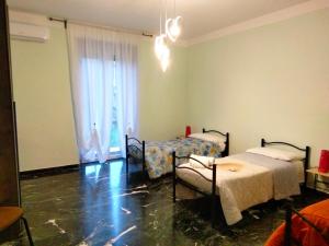 Postel nebo postele na pokoji v ubytování Casa di Anna
