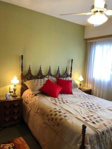 En eller flere senge i et værelse på Malevo