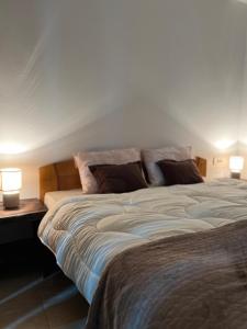 Ένα ή περισσότερα κρεβάτια σε δωμάτιο στο Apartman Vučko