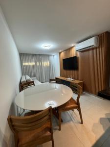 Ruang duduk di Apartamento Águas de Guarajuba apart hotel