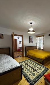 Postel nebo postele na pokoji v ubytování Florija’s Guesthouse