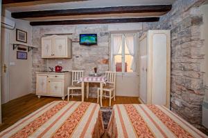 Kuchnia lub aneks kuchenny w obiekcie Residence MARCO POLO Centro Storico