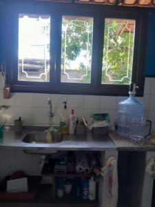 Køkken eller tekøkken på Casa Aconchegante Porto Segur + 24 billeder