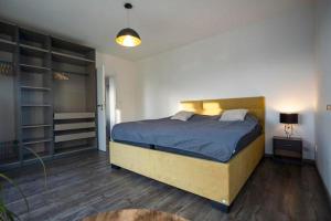 Postel nebo postele na pokoji v ubytování Apartmán AG