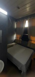Postel nebo postele na pokoji v ubytování Hotel Rio Puntarenas