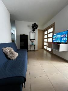TV a/nebo společenská místnost v ubytování Alessandro estilo italiano