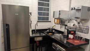 Køkken eller tekøkken på Studio na Praia de Botafogo