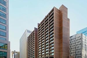 a tall building in a city with tall buildings at Sheraton Ottawa Hotel in Ottawa